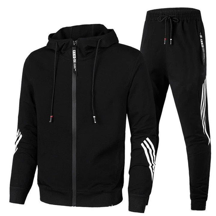 Sportief heren trainingspak met hoodie en joggingbroek, perfect voor trainingen, hardlopen of een actieve dag.