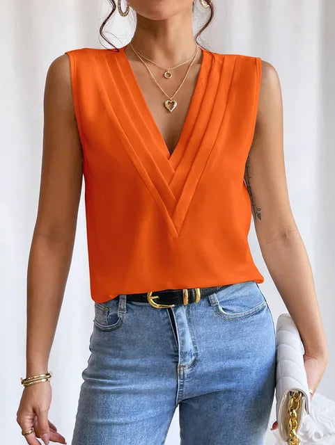 "Mouwloze oversized blouse, elegant en veelzijdig in beige, groen, oranje, wit of zwart, damesmode tops"