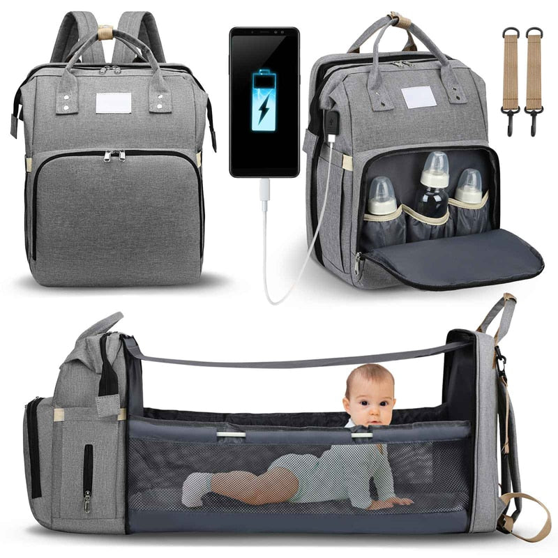 Comfortabel draagbaar babybed en handige luiertas in één; perfect voor reizende ouders.