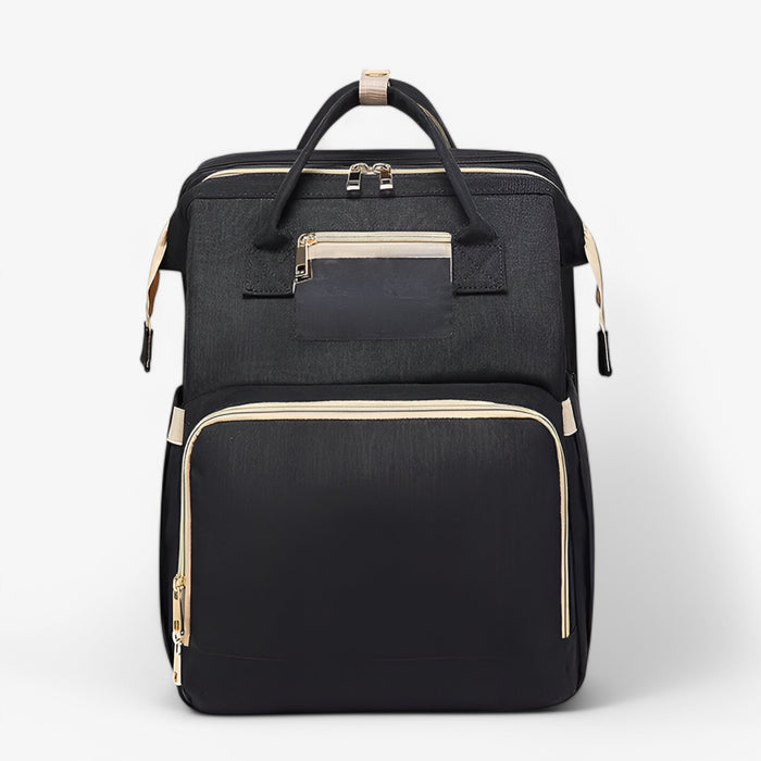 Complete babytas Noëlle: verzorgingstas en draagbaar babybedje in één, perfect voor reizen.