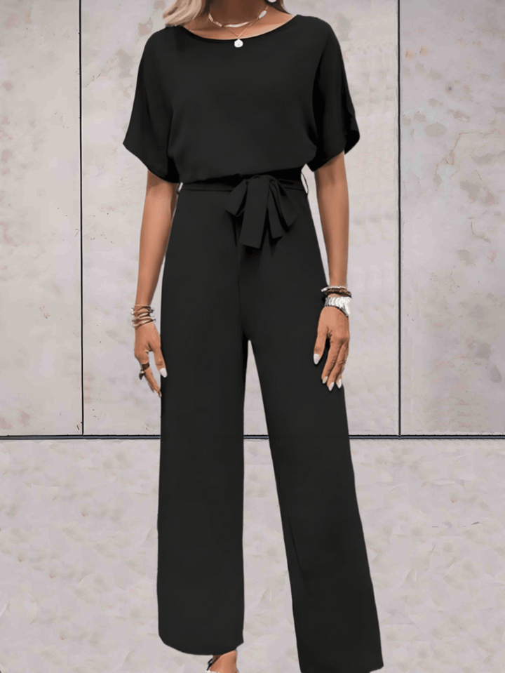 "Noa jumpsuit dames, stijlvol en comfortabel, wijde mouwen, striklinten, ademende stof, chic en veelzijdig."