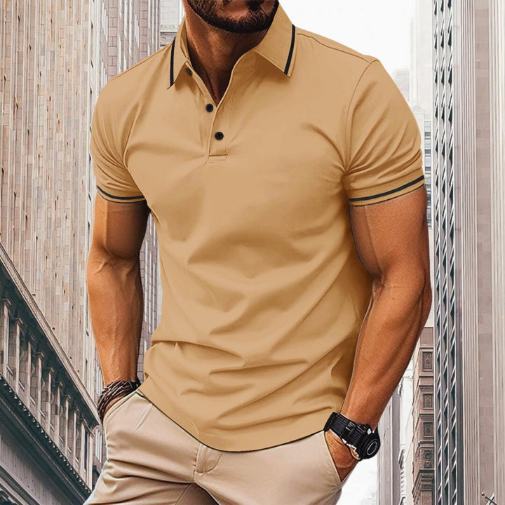 "Oliver Slim Fit Polo voor heren: ademend katoen met contrasterende kraag en mouwdetails, slanke pasvorm."