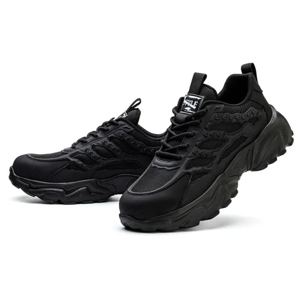 "Onverwoestbare zwarte werksneakers met stalen neus, anti-plet, flexibele zool, ideaal voor bescherming en comfort."