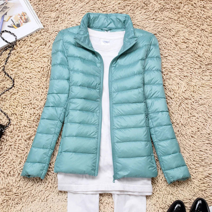 Comfortabel opvouwbaar damesjack met capuchon, lange mouwen, voor dagelijks casual gebruik.