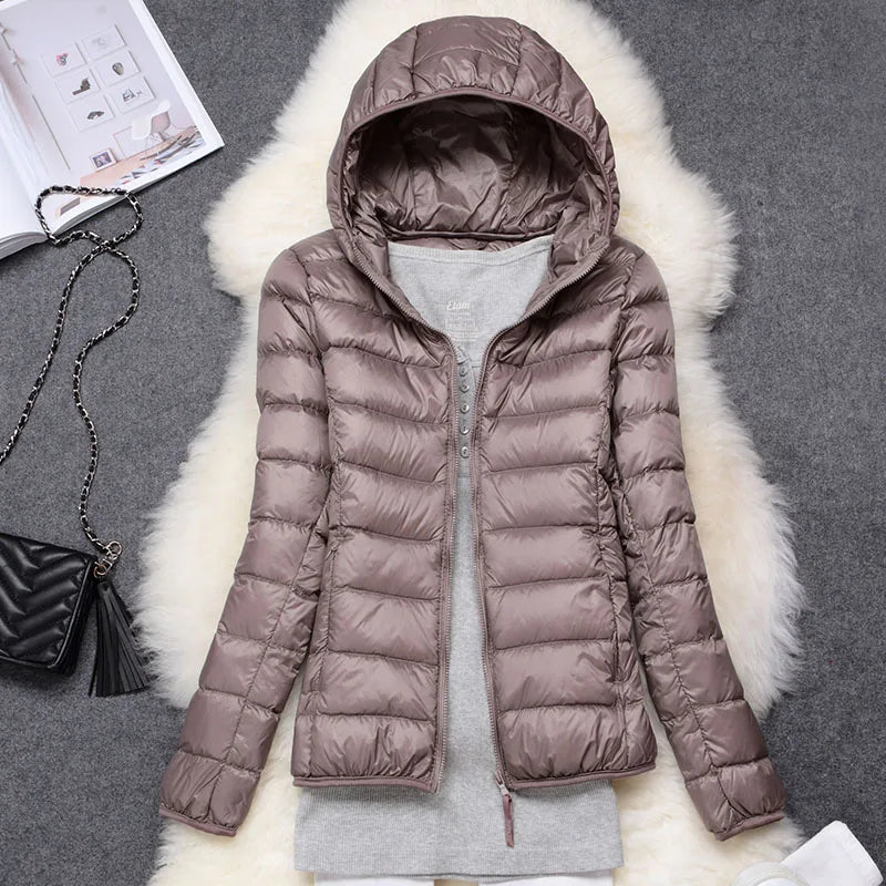Dames opvouwbaar jack met capuchon, perfect voor herfst en winter buitenkleding.