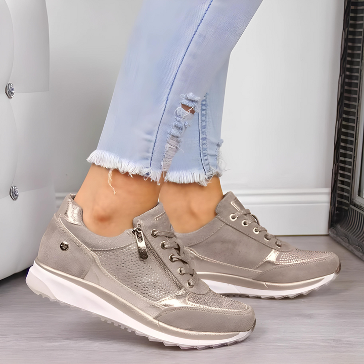 "Orthopedische dameswandelschoenen, stijlvolle grijze sneakers met goede ondersteuning en duurzaam materiaal."