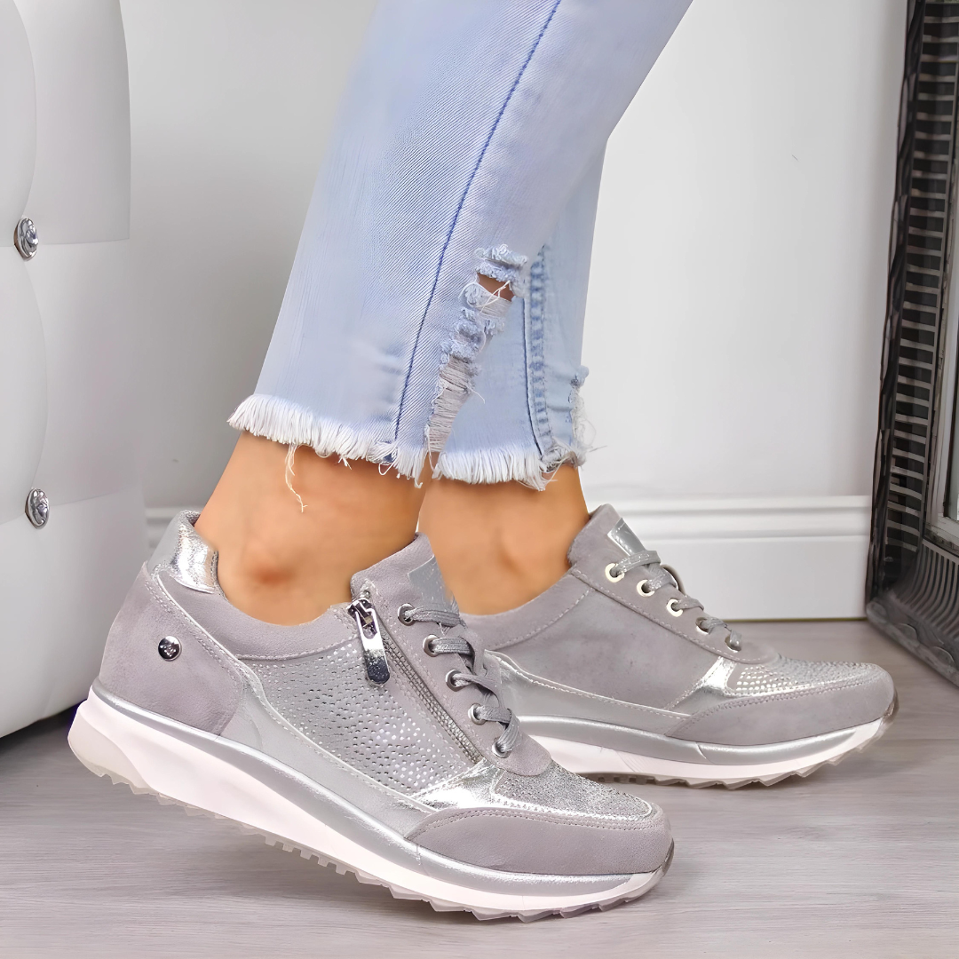 "Orthopedische dameswandelschoenen, stijlvolle grijze sneakers met goede ondersteuning en duurzaam materiaal."