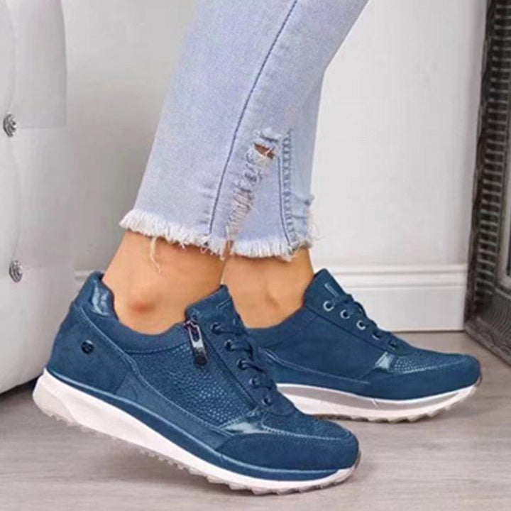 "Orthopedische dameswandelschoenen, stijlvolle grijze sneakers met goede ondersteuning en duurzaam materiaal."