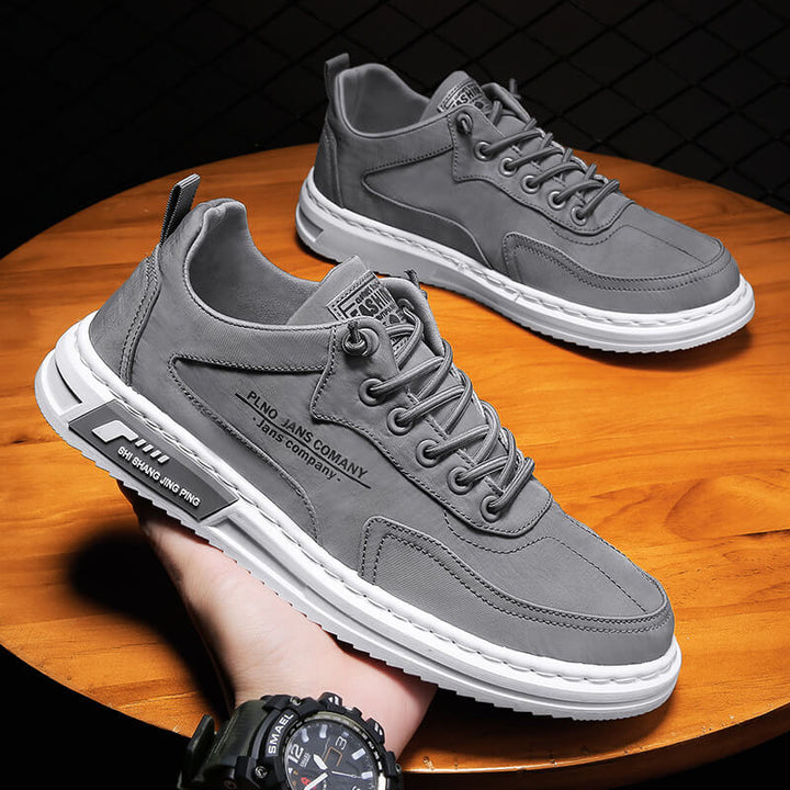 "Orthopedische heren sneakers met ademend grijs design en antislip rubberen zolen voor stijlvol comfort en ondersteuning."