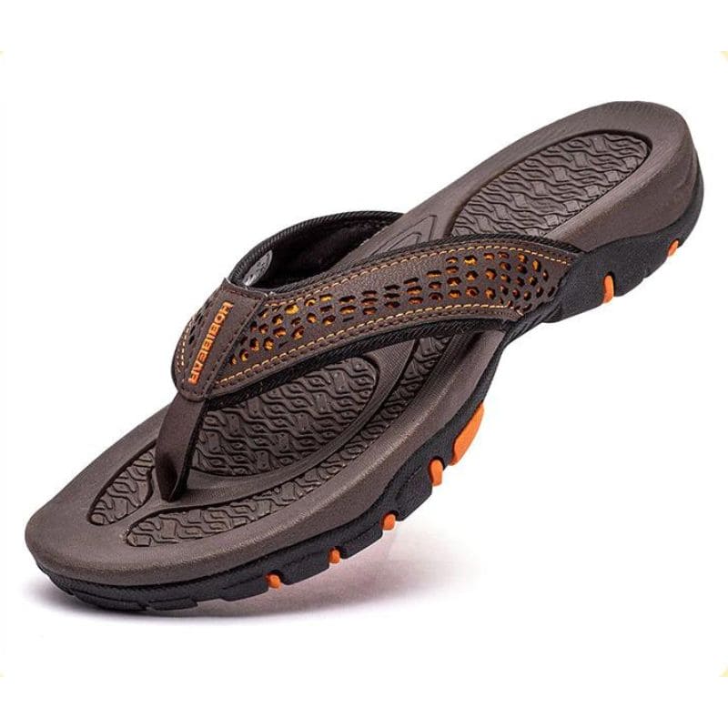 Orthopedische herenslippers met ademend bovenwerk en comfortabel voetbed, ideaal voor thuis en buiten.