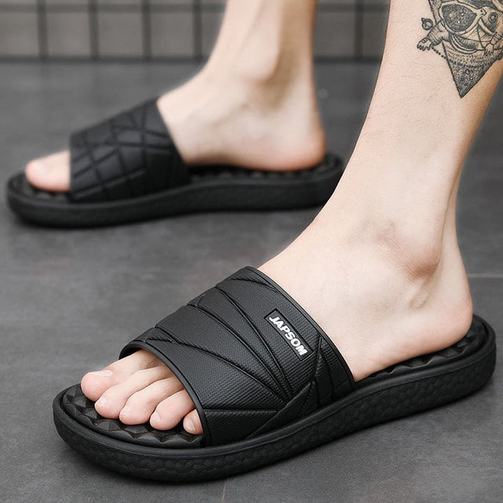 Orthopedische herenslippers met ademend bovenwerk en comfortabel voetbed, ideaal voor thuis en buiten.
