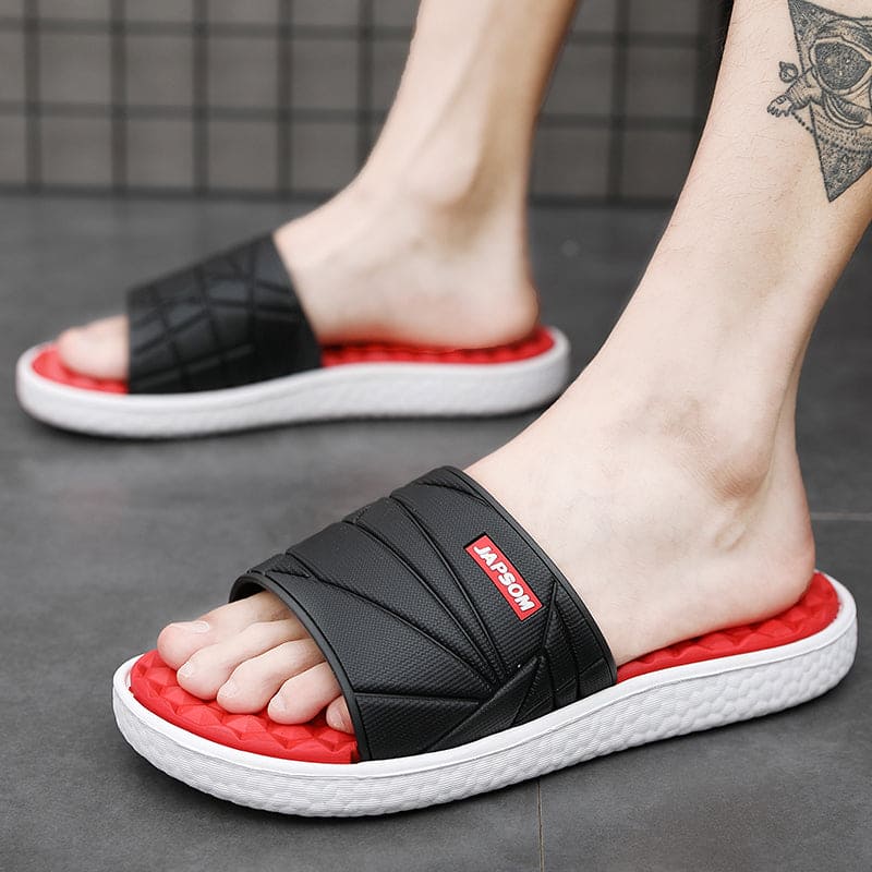 Orthopedische herenslippers met ademend bovenwerk en comfortabel voetbed, ideaal voor thuis en buiten.