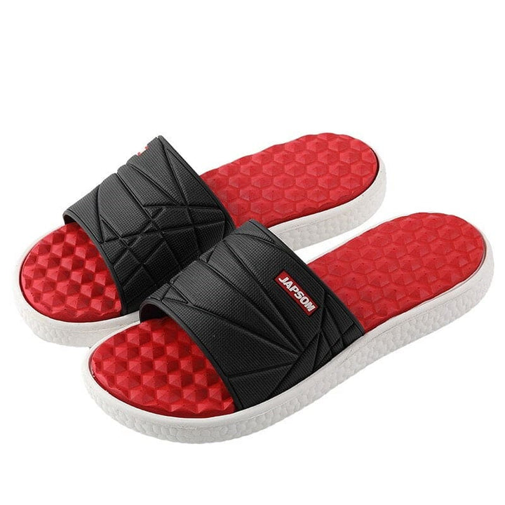 Orthopedische herenslippers met ademend bovenwerk en comfortabel voetbed, ideaal voor thuis en buiten.