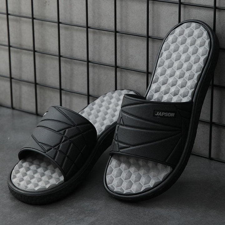 "Orthopedische slippers heren met ademend bovenwerk en comfortabel voetbed, ideaal voor zowel thuis als buiten."