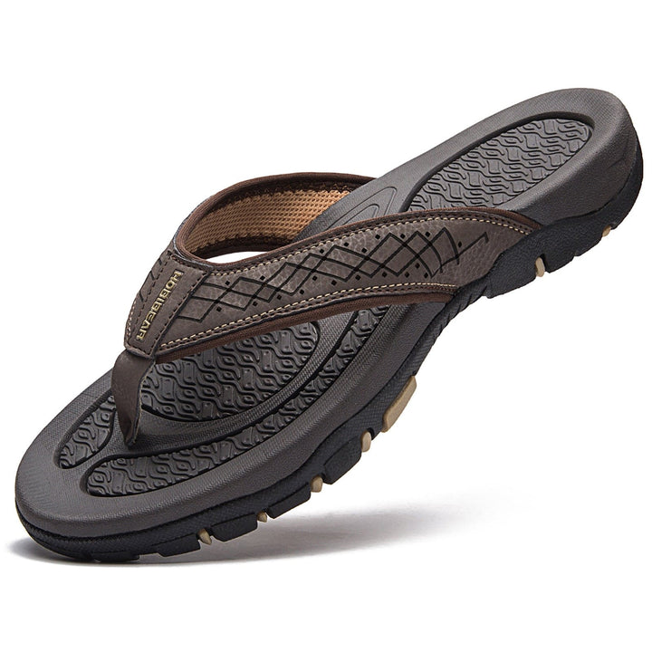 Orthopedische herenslippers met ademend bovenwerk en comfortabel voetbed, ideaal voor thuis en buiten.