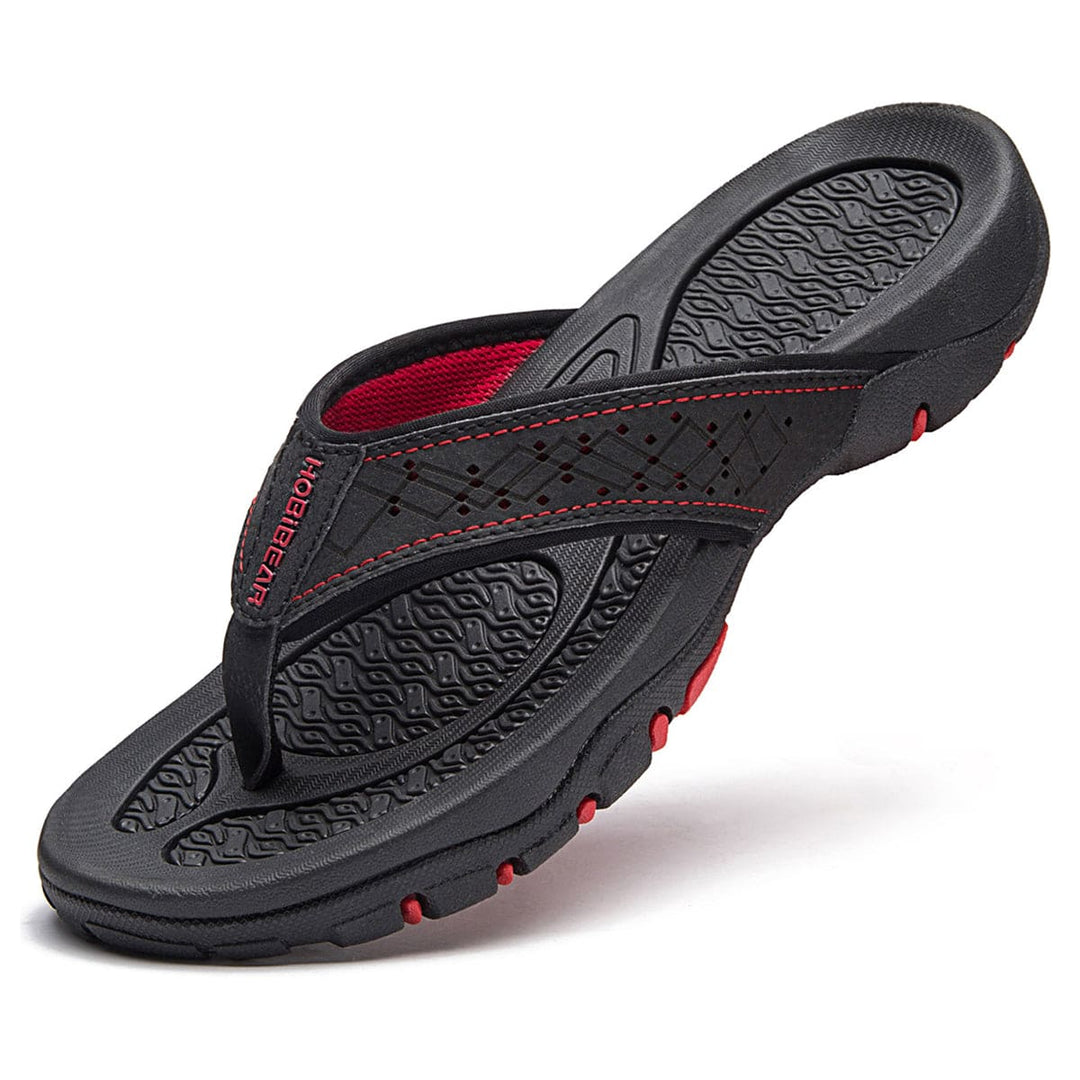 Orthopedische herenslippers met ademend bovenwerk en comfortabel voetbed, ideaal voor thuis en buiten.