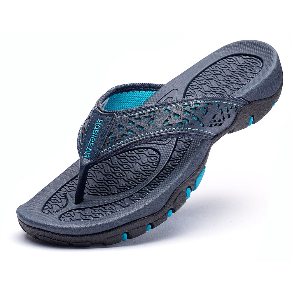 Orthopedische herenslippers met ademend bovenwerk en comfortabel voetbed, ideaal voor thuis en buiten.