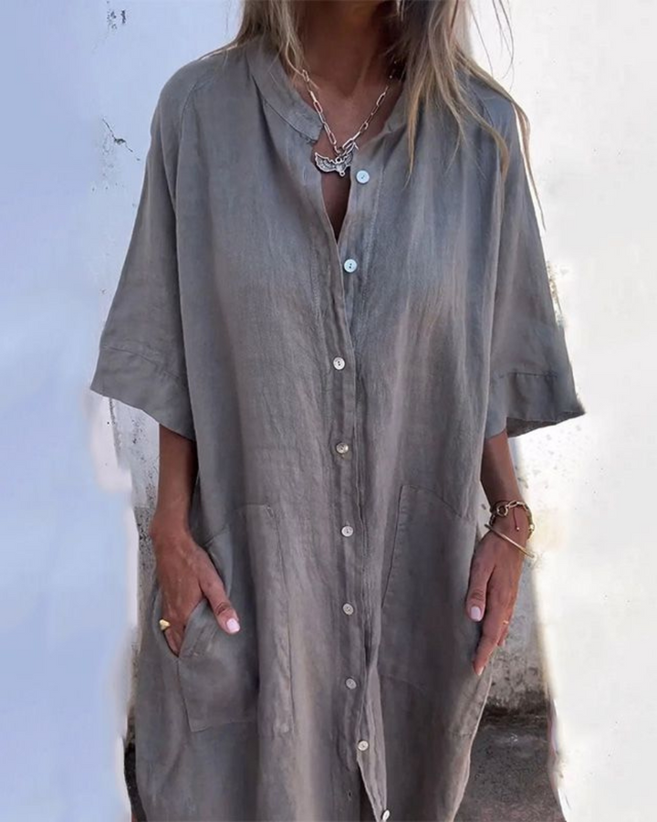 Luchtige oversized midi shirtdress voor dames, comfortabel en veelzijdig met knopen en een zijsplit.