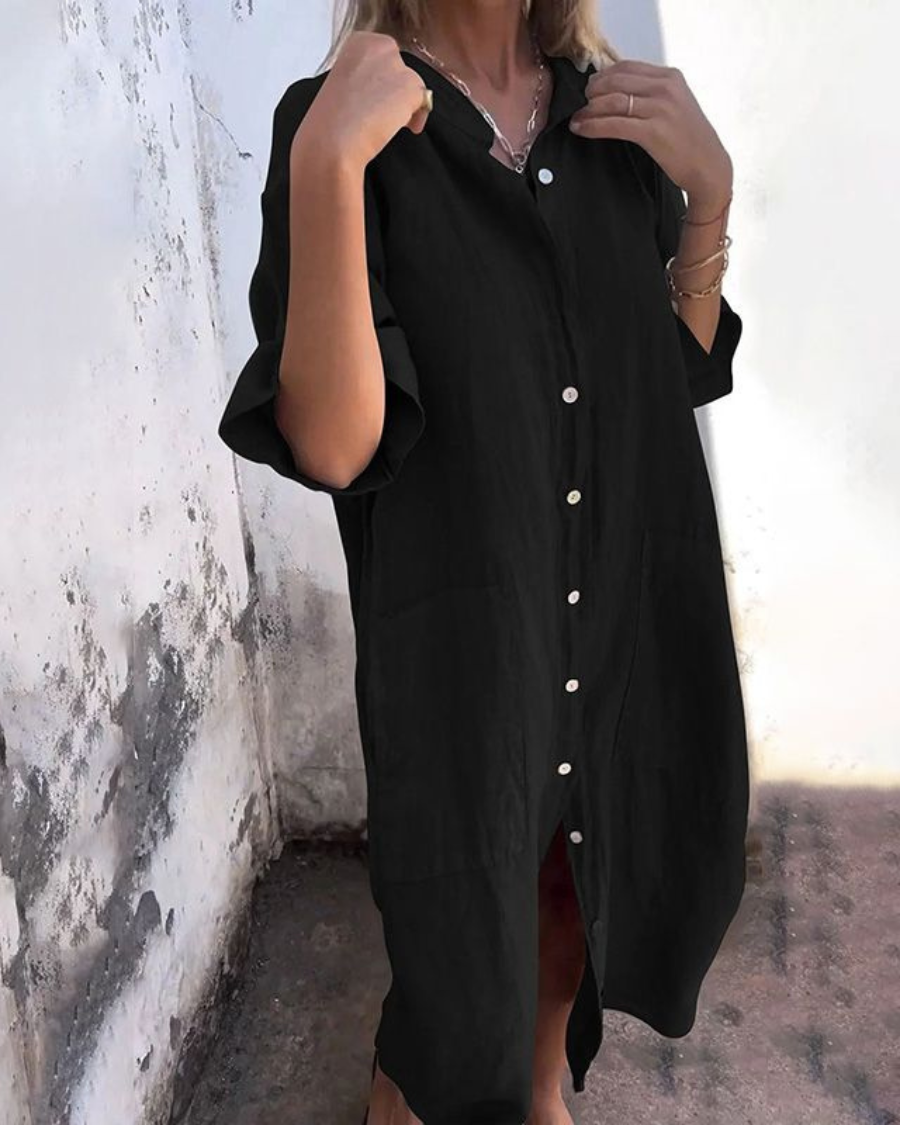 Modieuze dames tuniekjurk, oversized midi model met knoopsluiting en trendy zijsplit voor de zomer.