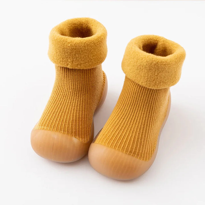 Antislip loopschoenen voor baby's, bieden de perfecte balans tussen bewegingsvrijheid en grip.