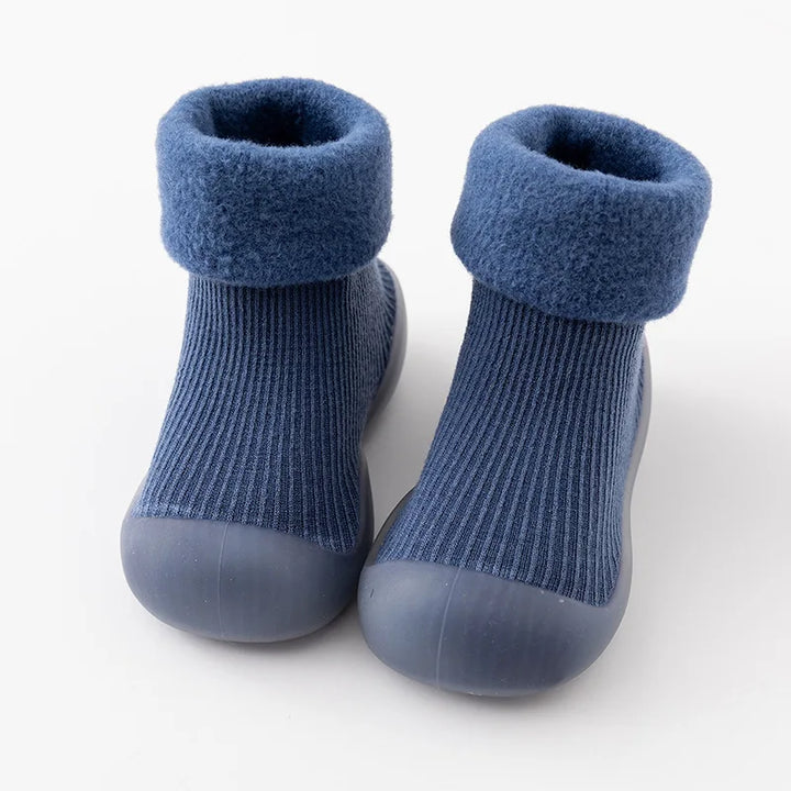 Lichtgewicht babyschoentjes voor eerste stapjes, met flexibele zool en antislip eigenschappen.