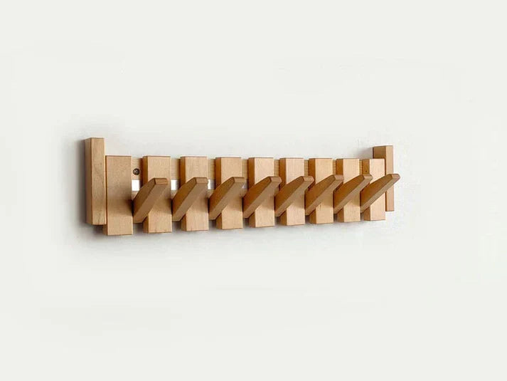 "Pianovormige houten kapstok met uniek design, vervaardigd uit hoogwaardig hout, geschikt voor jassen en accessoires."