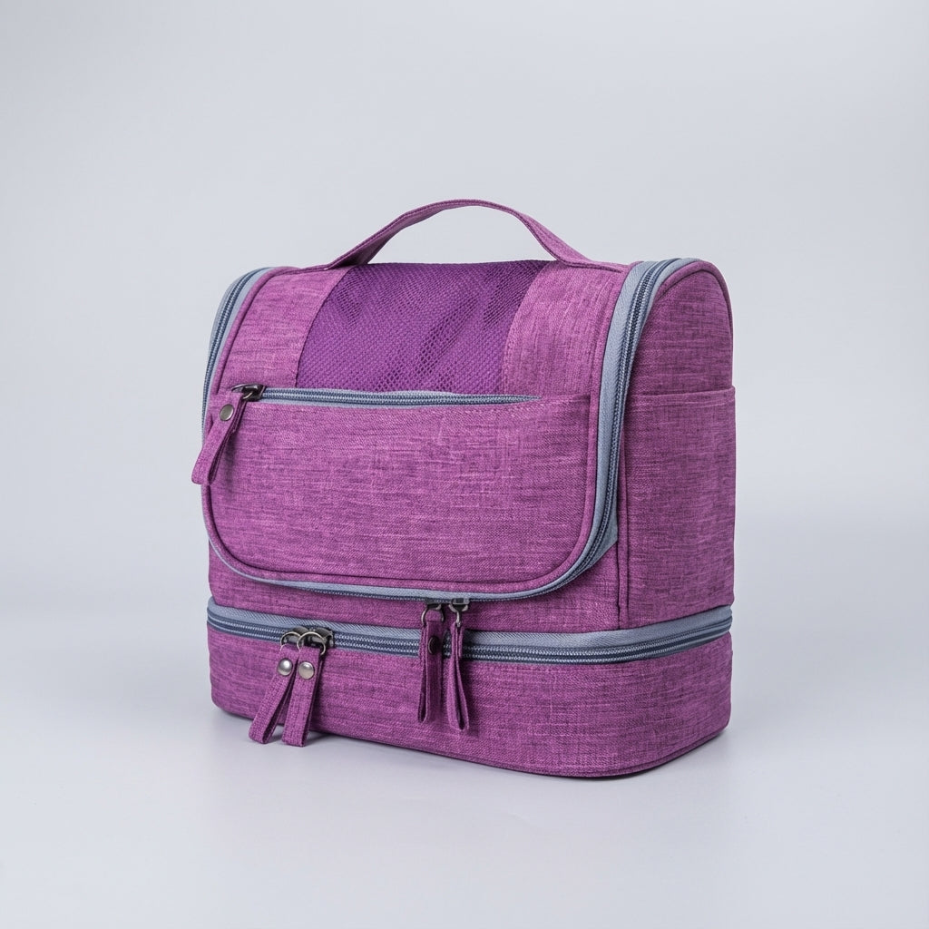 De Voyageluxe reistoilettas met dubbel compartiment: compacte, handige organizer voor al je hygiëneproducten onderweg.