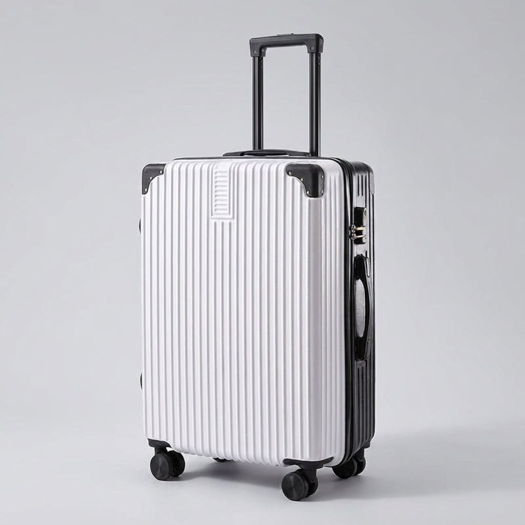 Elegante retro reiskoffer met beschermende hoeken, soepele wielen en handvat voor moeiteloos vervoer van bagage.