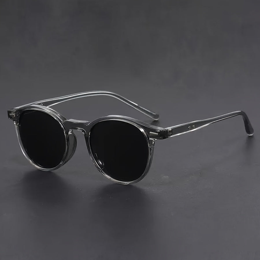 "Retro ronde heren zonnebril, lichtgewicht tortoiseshell frame, iconisch accessoire voor de moderne man, stijlvol en trendy."