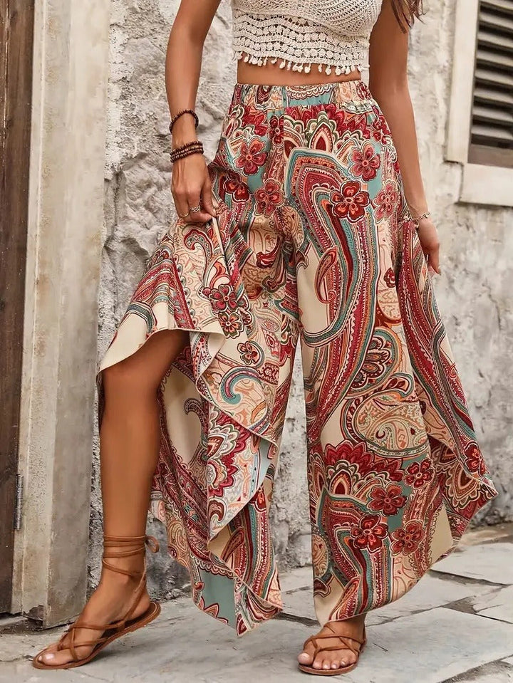 Vakantieklare damesbroek met wijde pijpen en unieke bohemian print; comfortabel en stijlvol voor elke zomerlook.