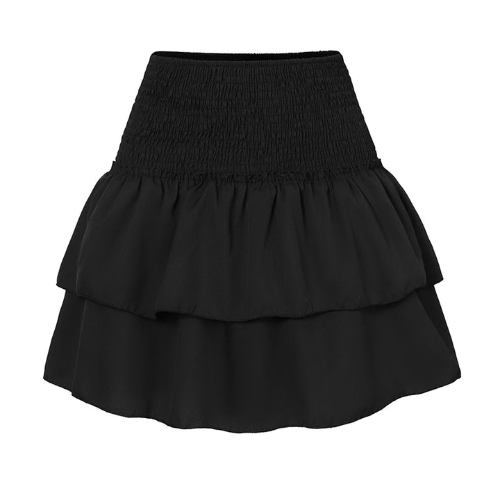 "Rose kleur zomerrokje, stijlvol en comfortabel mini-rokje ideaal voor warme dagen, met elegante en luchtige uitstraling."