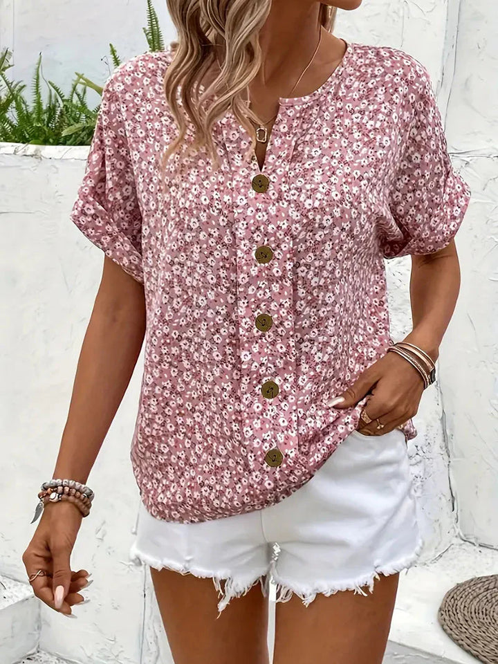 Comfortabele casual dames blouse met zomerse bloemenprint en knoopsluiting, ideaal voor een relaxte look.