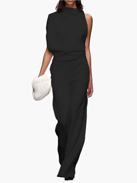 Roze mouwloze dames jumpsuit met wijde pijpen en ronde hals, ideaal voor een zomerse dag of feest.