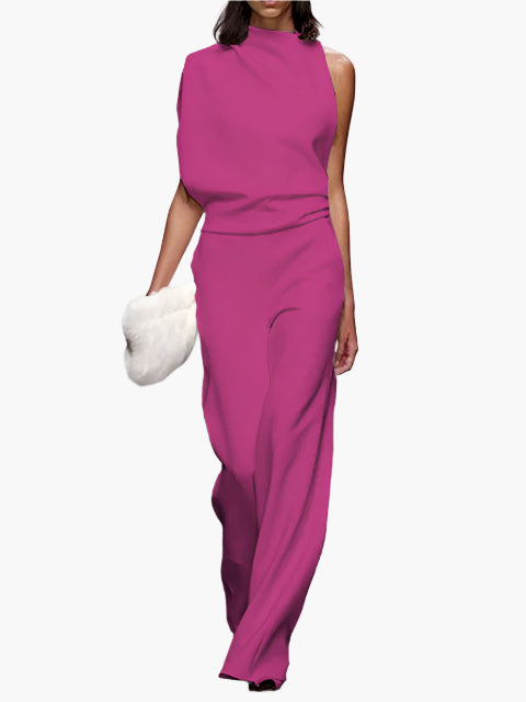 Zwarte dames jumpsuit voor Koningsdag, mouwloos met wijde pijpen en ronde hals, feestelijk en stijlvol.
