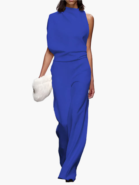Feestelijke dames jumpsuit, mouwloos, wijde pijpen, ronde hals. Elegant voor avondje uit of speciale momenten.