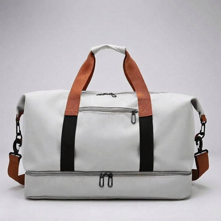 Veelzijdige weekendtas of gymtas, unisex model. Ruim interieur en apart compartiment voor schoenen.
