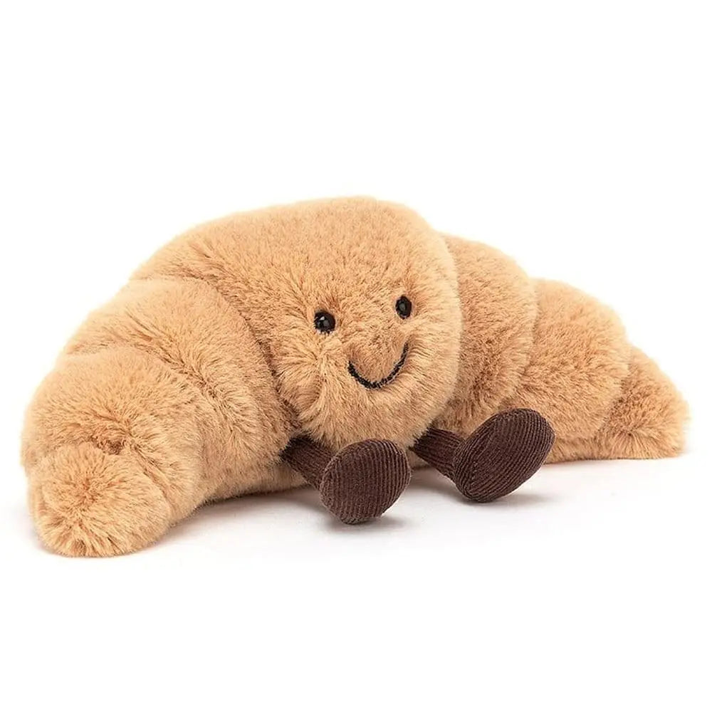 Zacht pluchen croissant kussen, perfect als knuffelspeelgoed voor kinderen of unieke woondecoratie.