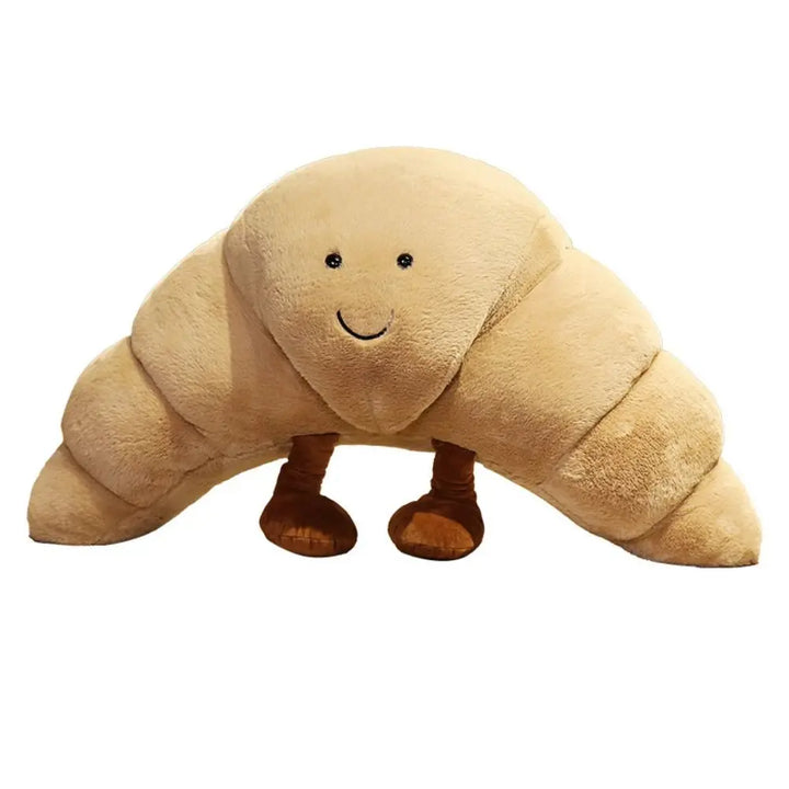 Pluchen croissant speelgoed, een zacht en schattig kussen met een lachend gezicht voor de kinderkamer.