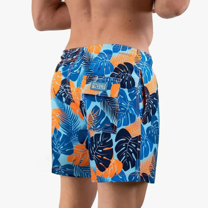 "Sneldrogende heren zwembroek met moderne pasvorm, blauw met elastische taille en trekkoord, stijlvol en comfortabel."
