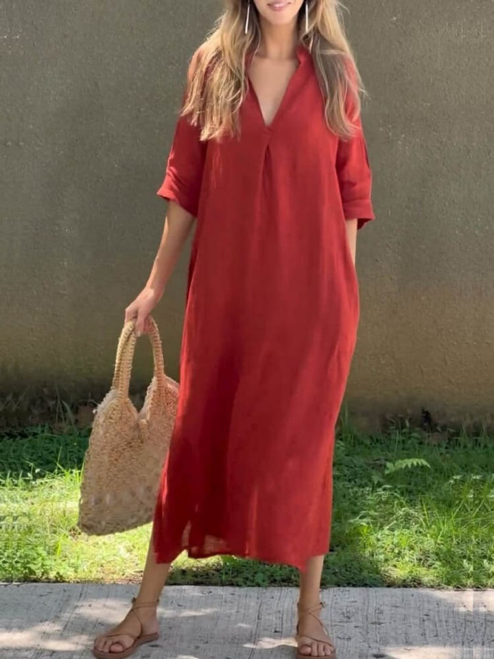 Soepelvallende midi damesjurk Tess met mouwen, ideaal voor casual of elegante gelegenheden.
