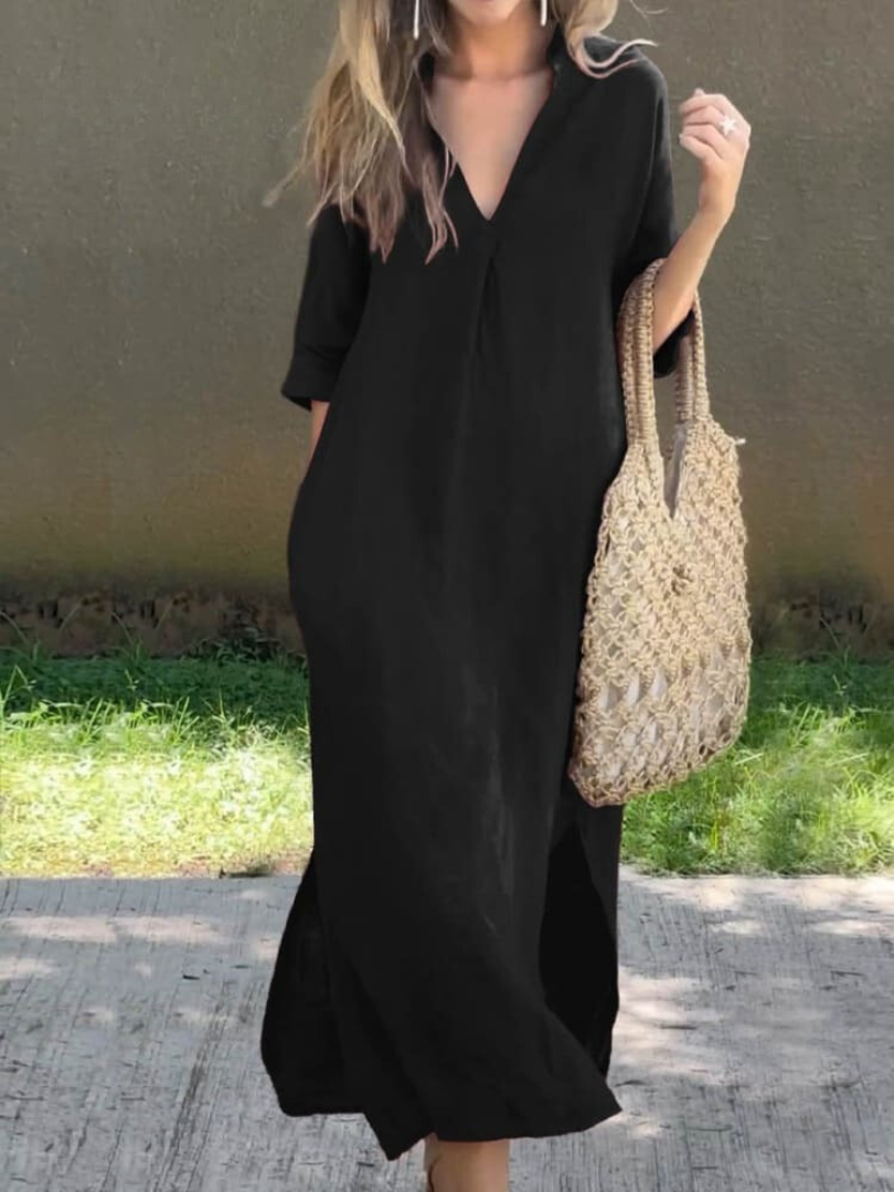 Comfortabele en elegante soepelvallende midi jurk met mouwen voor dames, perfect voor diverse seizoenen.