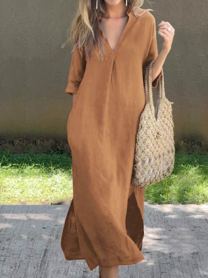 Stijlvolle damesjurk Tess, een soepelvallende midi jurk met comfortabele mouwen, voor een elegante alledaagse look.