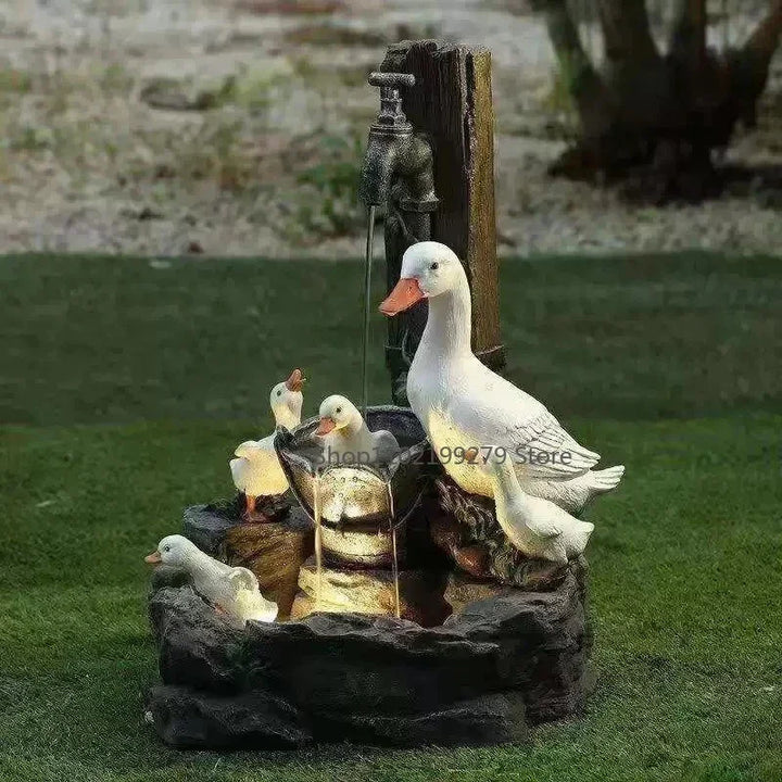 Solar tuin fontein met eend en eekhoorn, ideaal voor terras decoratie en buitenleven.