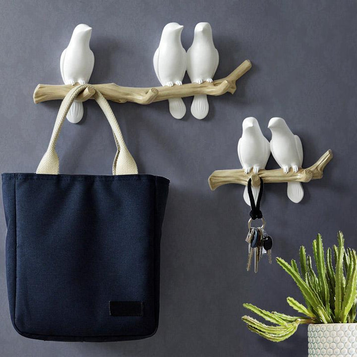 Decoratieve hars wandkapstok met vogelontwerp, ideaal voor interieurdecoratie en opberging.