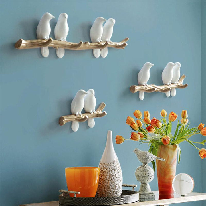 Stijlvolle wandkapstok met vogels, combineert huisdecoratie met functionele kledingopberging.