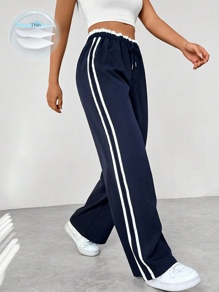 "Sportieve dames wide-leg broek, comfortabele pasvorm, elastische taille, trendy strepen, wijde pijpen, casual stijl"