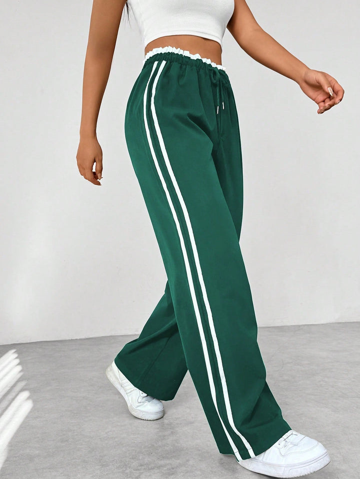 "Sportieve dames wide-leg broek, comfortabele pasvorm, elastische taille, trendy strepen, wijde pijpen, casual stijl"