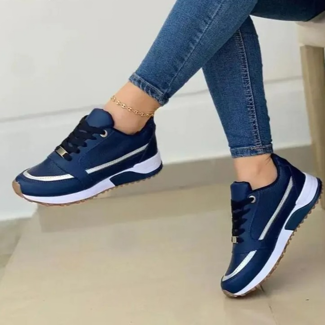 "Sportieve leren damesschoenen met zachte witte zool, elegant design in blauw, licht bruin of zwart, veelzijdig en stijlvol."