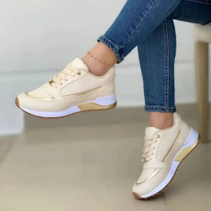 "Sportieve leren damesschoenen met zachte witte zool, elegant design in blauw, licht bruin of zwart, veelzijdig en stijlvol."