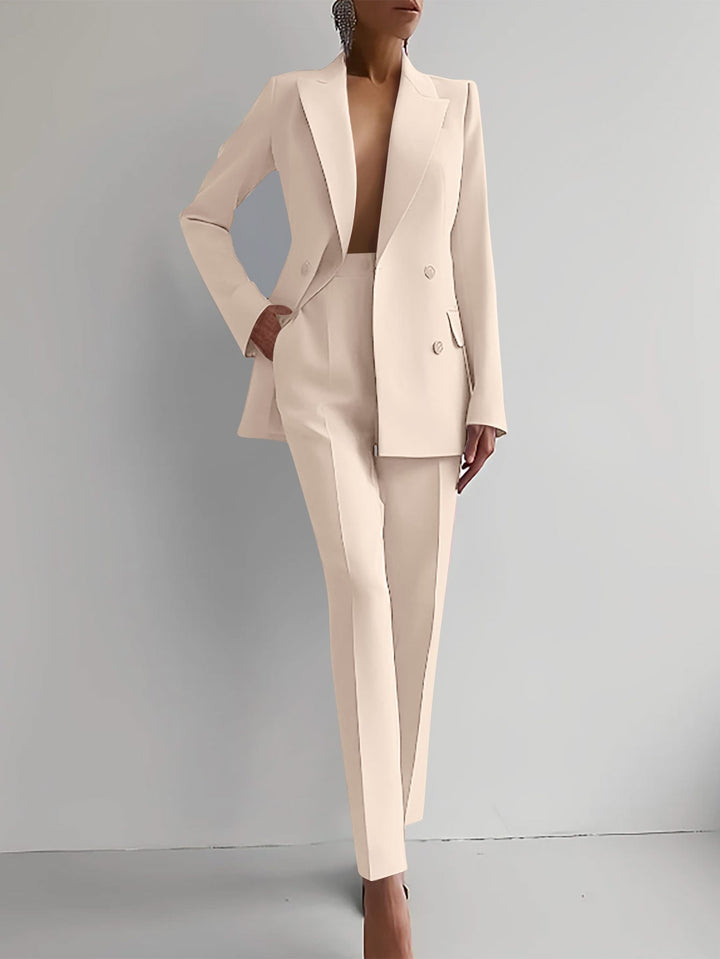Formele dames blazer en pantalon set, perfect voor chique evenementen en recepties.